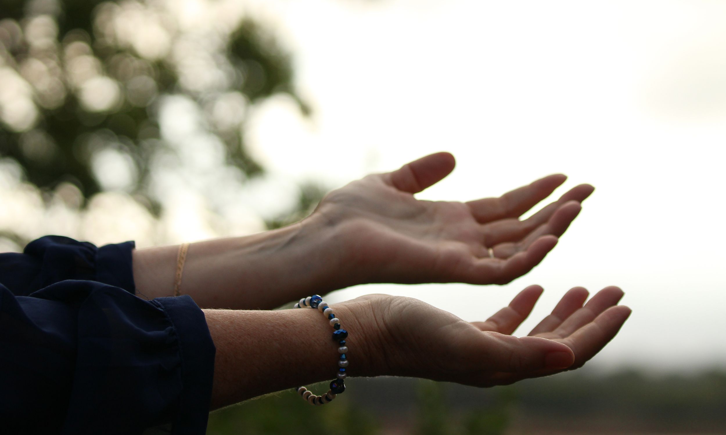 hands lifted in surrender to God for about peace promises collective page